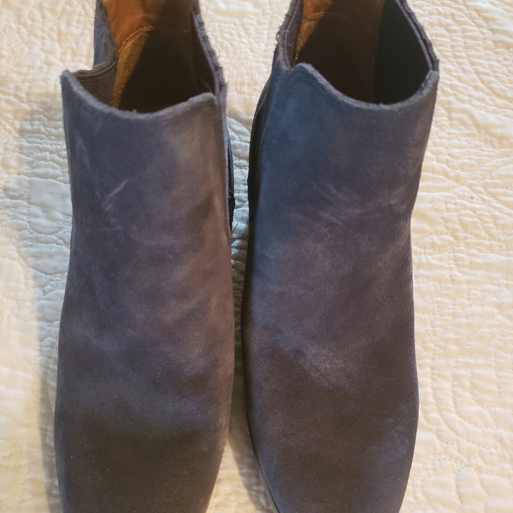 Blue suede booties.